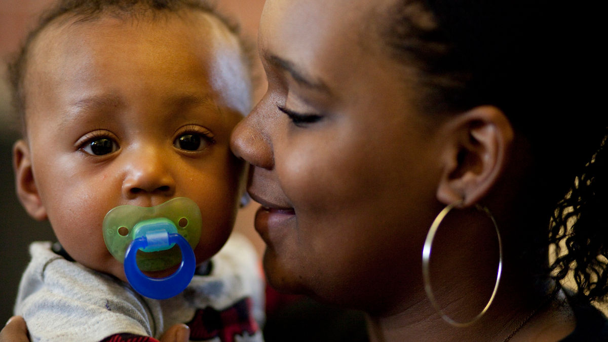 Joshua Joubert, 8 months, with mom, Berea Joubert, 16.  Child First program care coordinators and clinicians meet with families in Norwalk, CT.