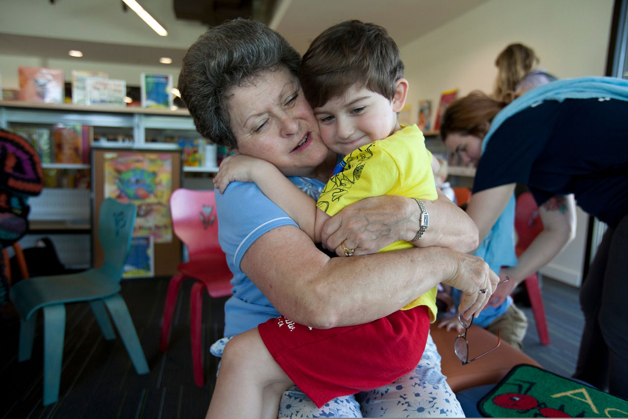 Story reading time at the Algiers Regional Library..Betty Giannone with her grandson, Remington Comardelle, 3.
