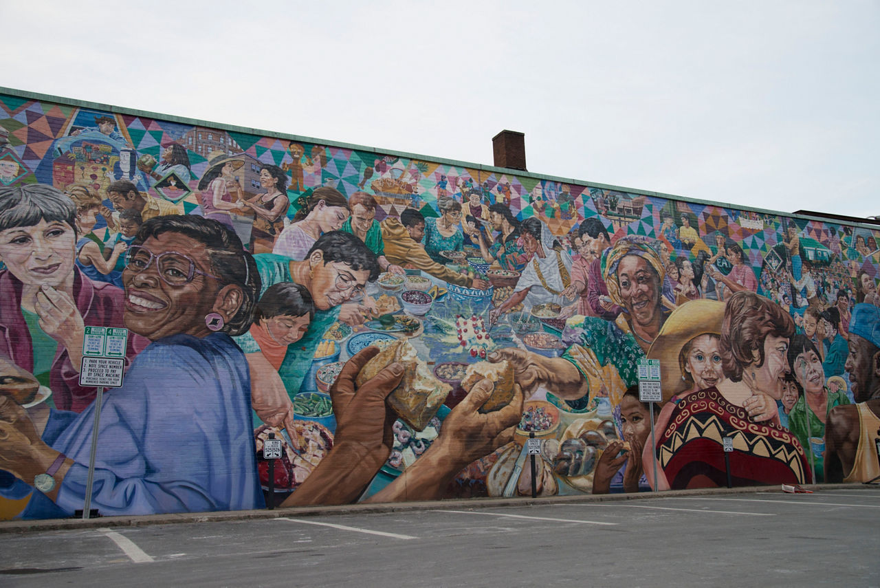 An outside wall mural depicts a global view.