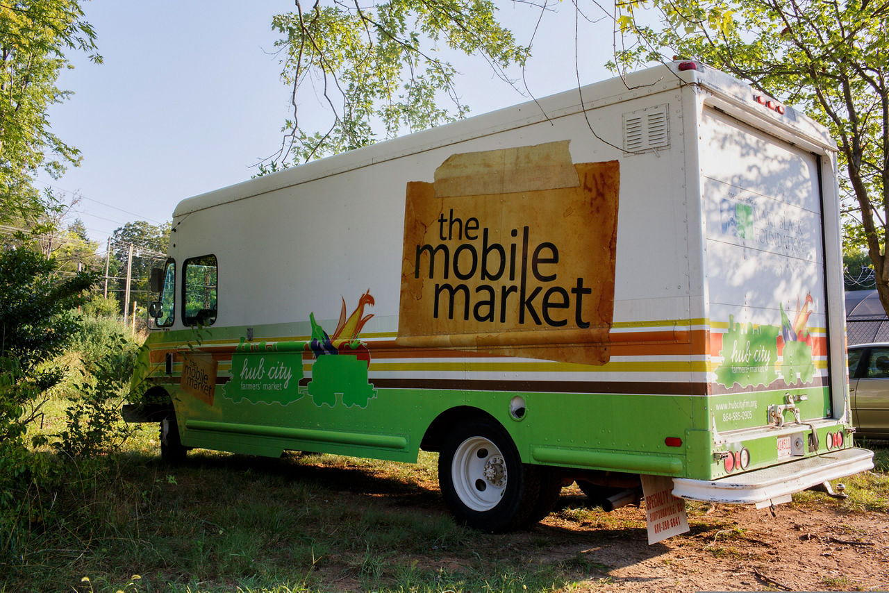 The Mobile Market is an extension of the hub City Farmers's Market which was purchased and refitted to expand the market's service to food deserts across Spartanburg County. In 2015, the Mobile Market is projected to make over 400 stops in Spartanburg.