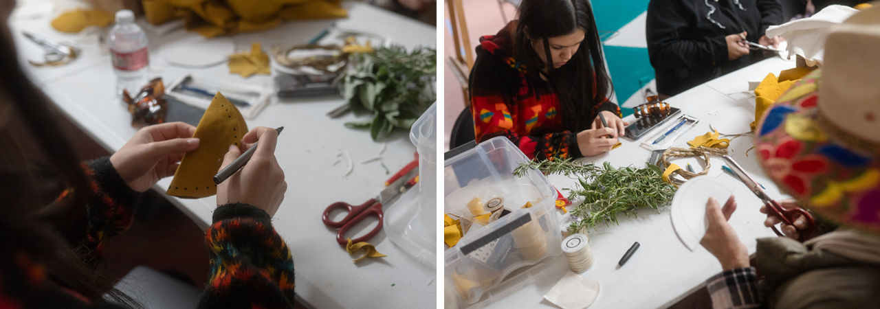 A group of people making medicine bags.