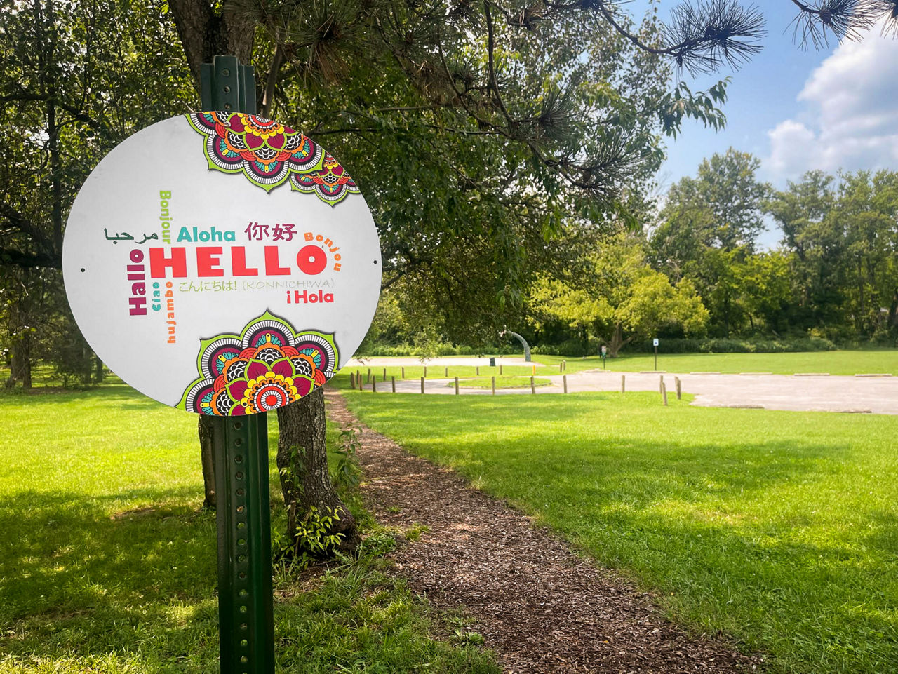 A sign designed to welcome people of all nationalities and languages.
