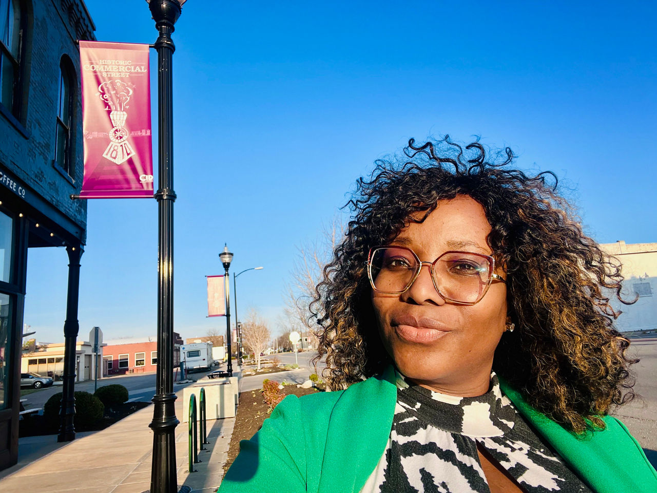Dami standing on historic C-Street in Springfield, Missouri.