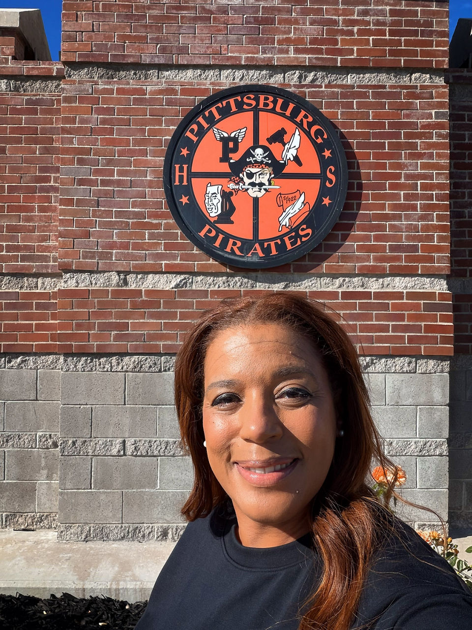 A selfie of Dionne Adams taken in front of the Pittsburg High School.