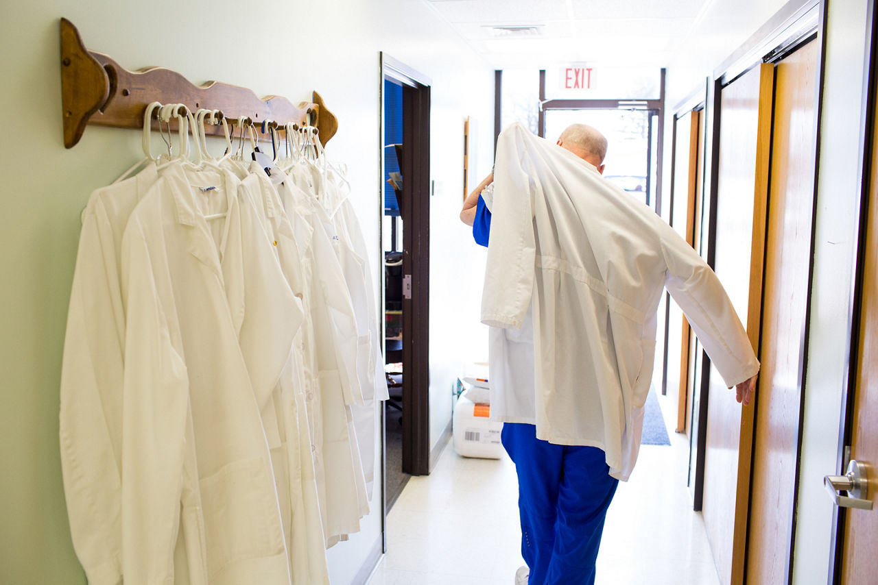 Dr. Michael Machen gets ready to see a patient at Bluestem Medical in Quinter, Kansas.