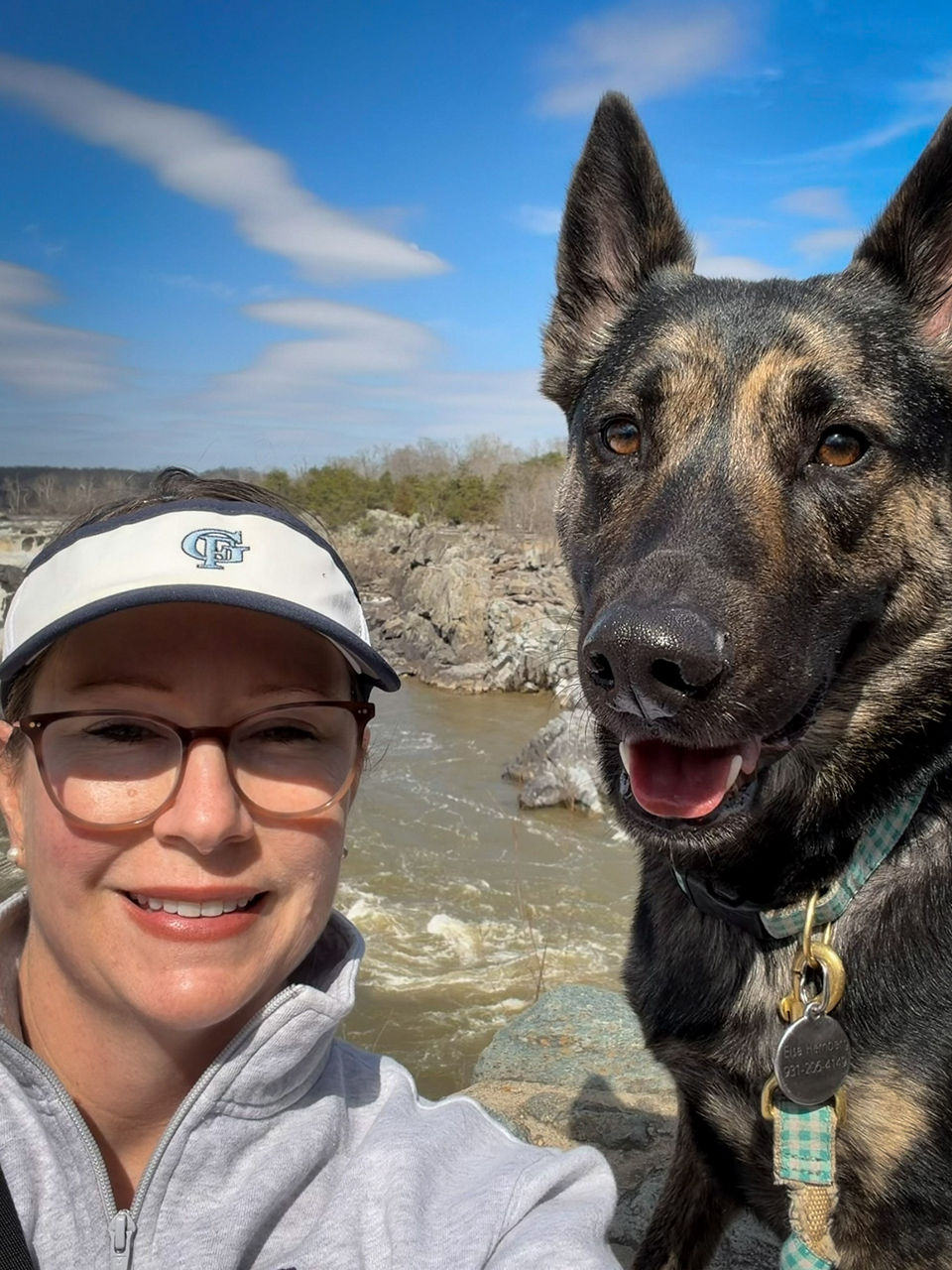 Emily at Great Falls National Park with her dog, Elsa.