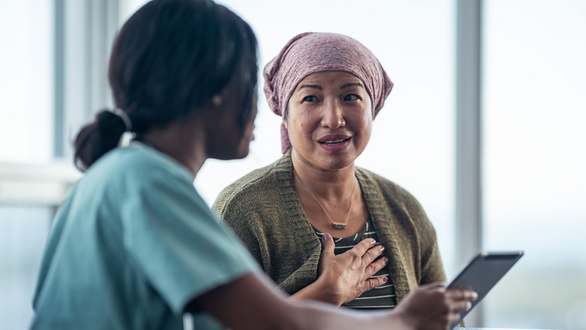 A doctor discusses a treatment plan with a patient.