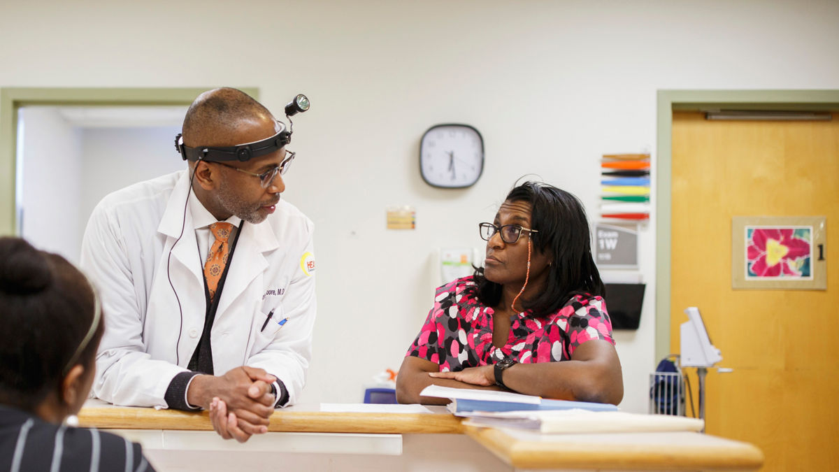 Doctor and nurse at nurse at clinic nurse station.