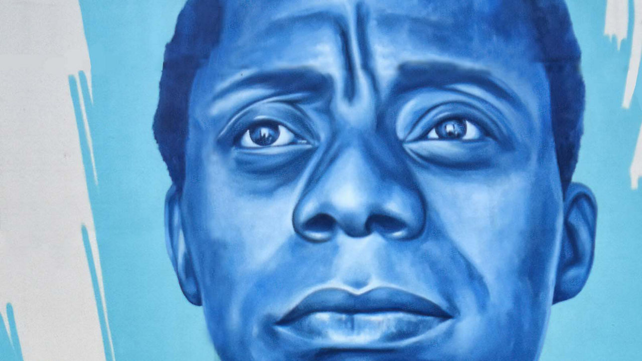 A mural portrait of James Baldwin by Jeff Zimmerman in Chicago, photographed by Damian Entwistle.