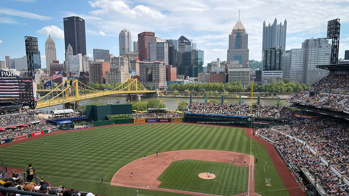 A baseball field with the skyline of Pittsburgh, P.A. as a backdrop.