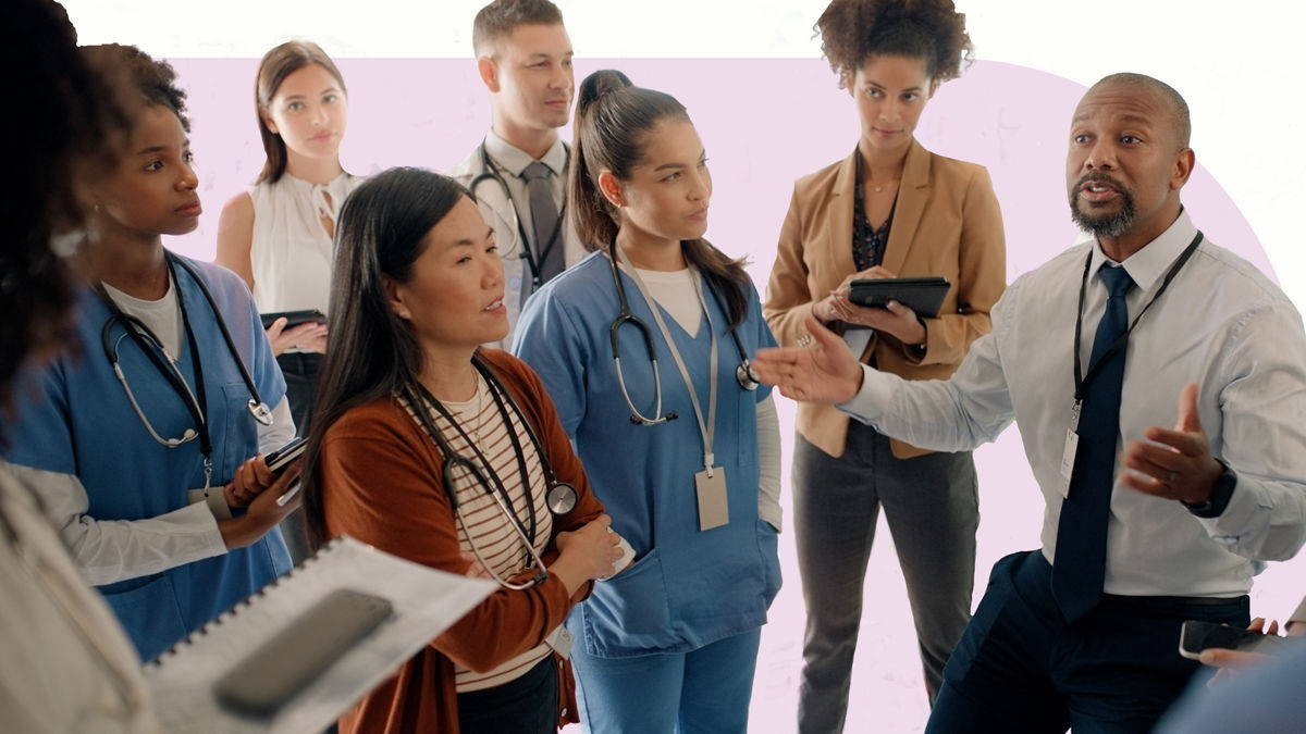 A group of diverse coworkers meeting.