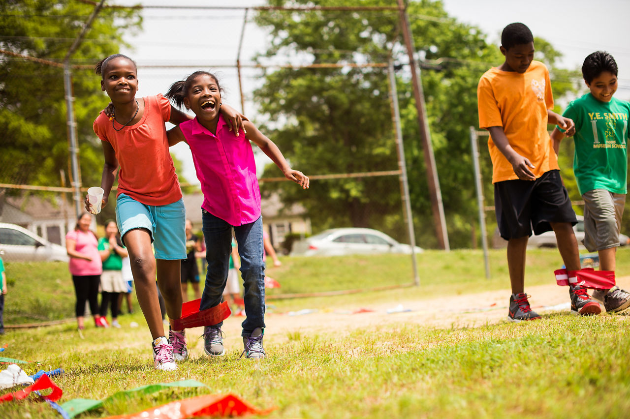 Children playing on a field.