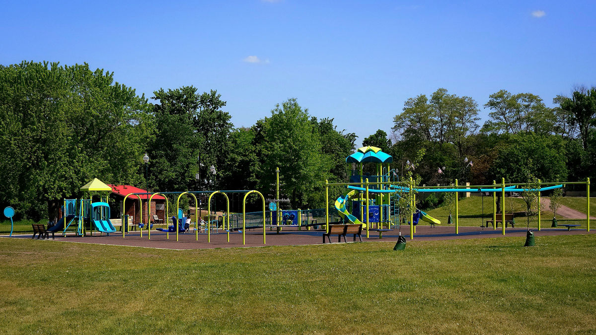 Swing sets in a city center park. 
