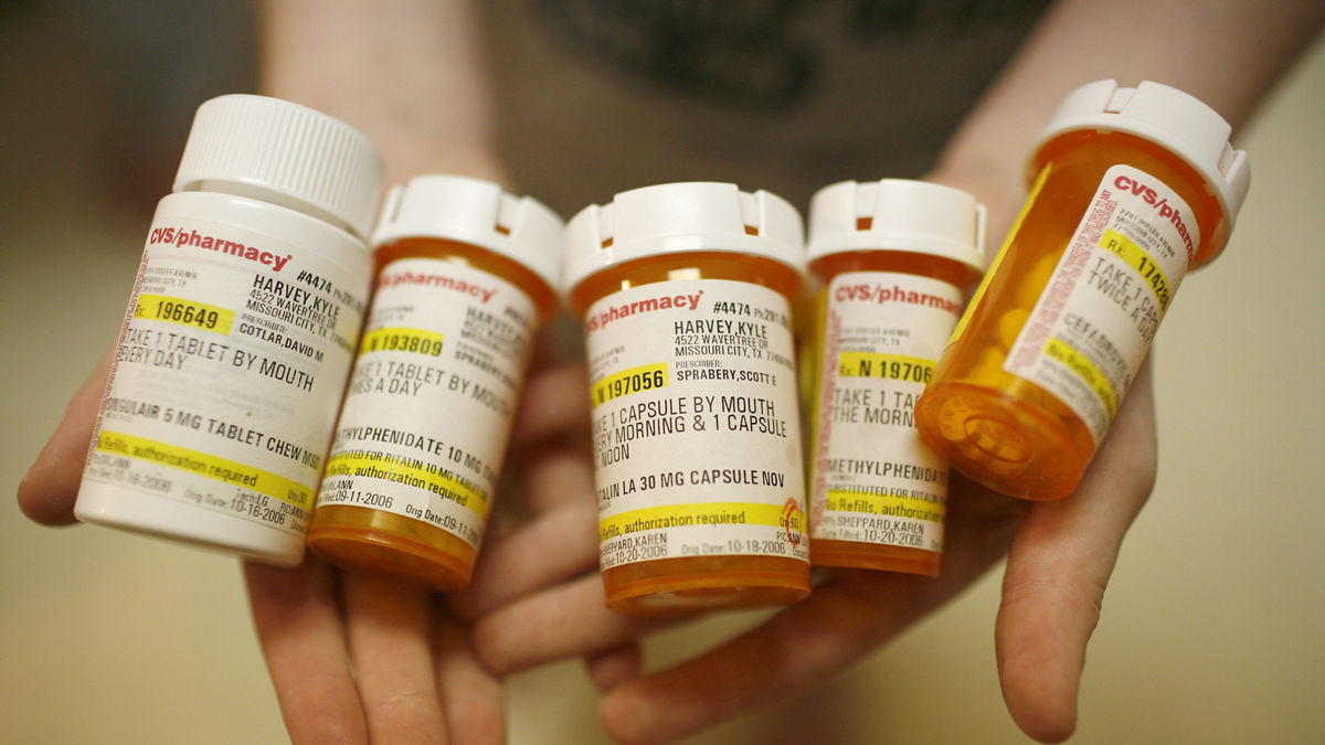 Prescription medical bottles.  Covering Kids & Families