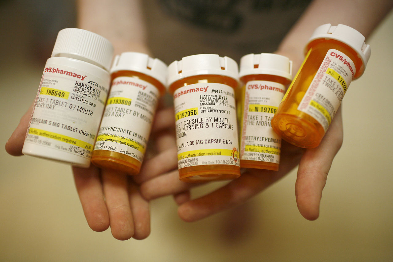 Prescription medical bottles.  Covering Kids & Families
