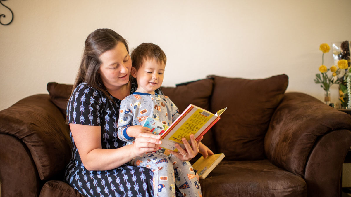 RWJF Culture of Health Prize 2019 - Gonzales, CA. Emily Rios pictured with her son Simon Jr (age 2). Emily previoulsy was a choir/guitar teacher grades 5-12 then became a stay at home mom and community volunteer. She provides music and movement  for the FFN Playgroup, facilitates a summer Mommy & Me play group for ages 0-3. Emily started a storytime with music and movement at the local library for ages 0-5. She also is  the director for the youth musical theatre program in Gonzales going on our 4th year where they have produced shows Annie Jr, Willy Wonka Jr & Wizard of Oz, that have kids K-12 from Gonzales unified and also those kids that do not attend GUSD but who live in Gonzales.  She is also an advisor for the high school dance club. All this is on a volunteer basis