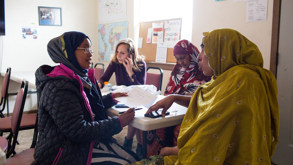 Residents gather at a neighborhood learning center.