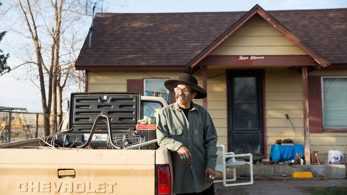 Mario Molina in front of the house he shares with his brother Cruz in Garden City, Kansas.  They inherited the house from their late parents.