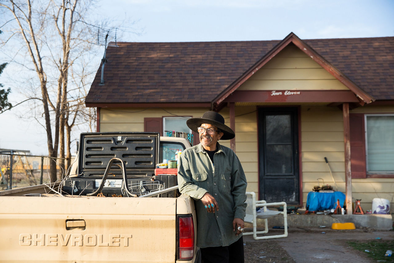 Mario Molina in front of the house he shares with his brother Cruz in Garden City, Kansas.  They inherited the house from their late parents.