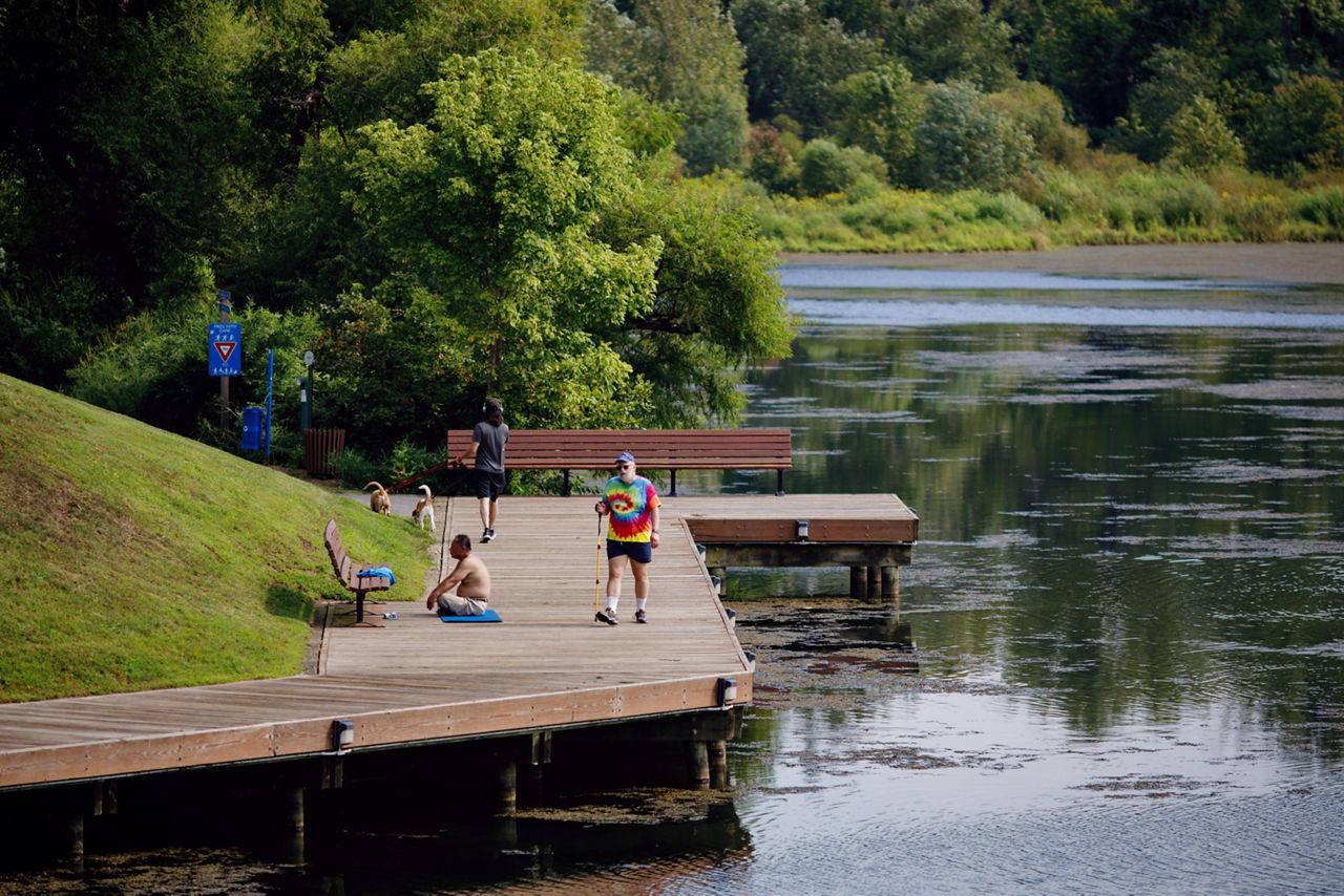 Residents enjoy Town Center, one of Columbia’s ten villages, along the shores of Lake Kittamaqundi in Columbia, MD.