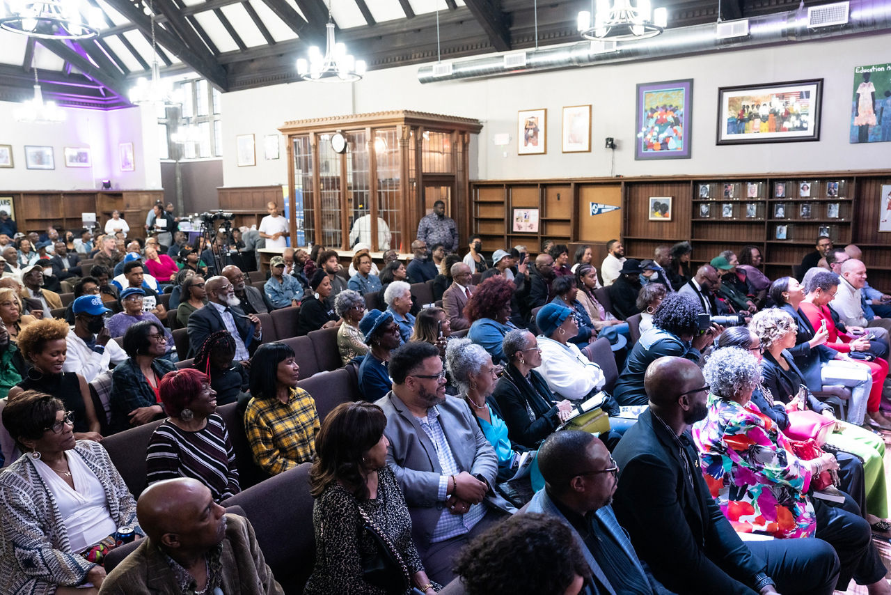 A crowd of seated people.