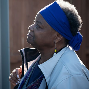 Setchem Thesmaat looks at old photographs at the Rondo Commemorative Plaza in St. Paul, MN on October 11, 2023.
