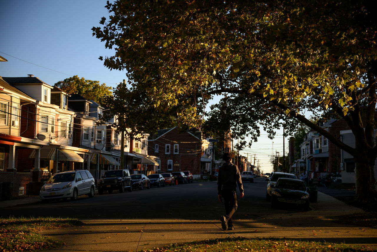 A teen walks a path at Martin Luther King, Jr. Park in Trenton, NJ on October 16, 2024.