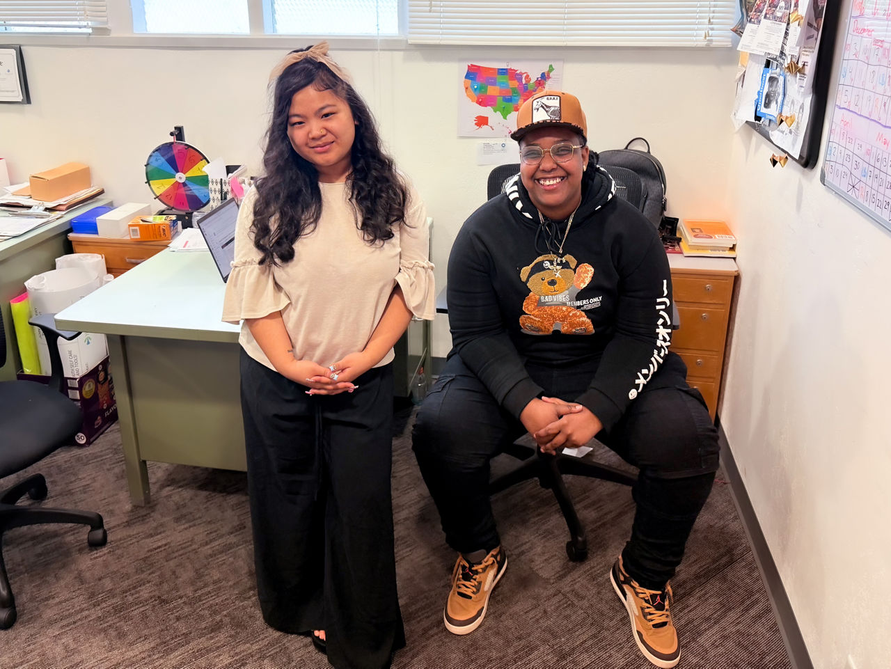 Araiye "Ray" Thomas-Haysbert (R), 25, and Jen Phanh (L), 20, are both community organizers at Youth Forward.