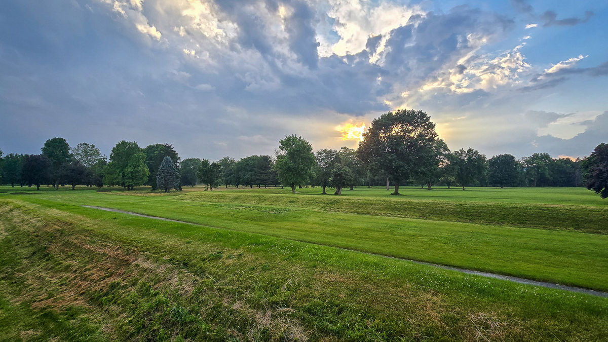 A photograph shows the connecting corridor between the Octagon and Great Circle of the Newark Earthworks in Ohio.
