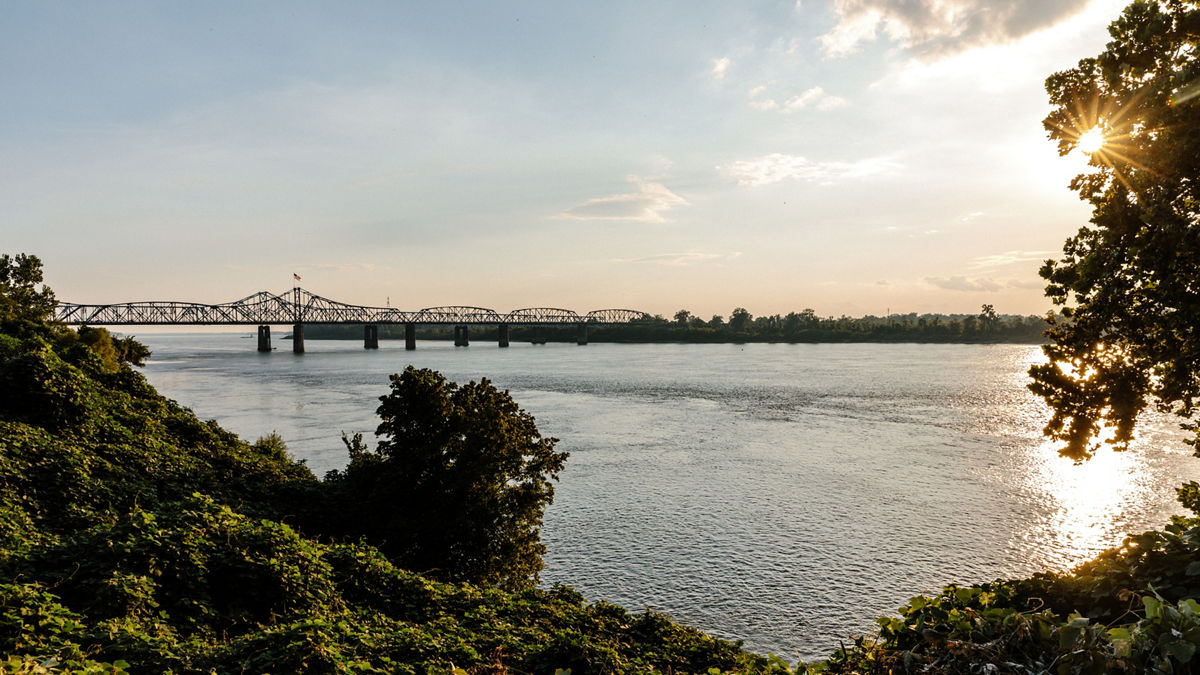 The sun setting over the Mississippi River. 