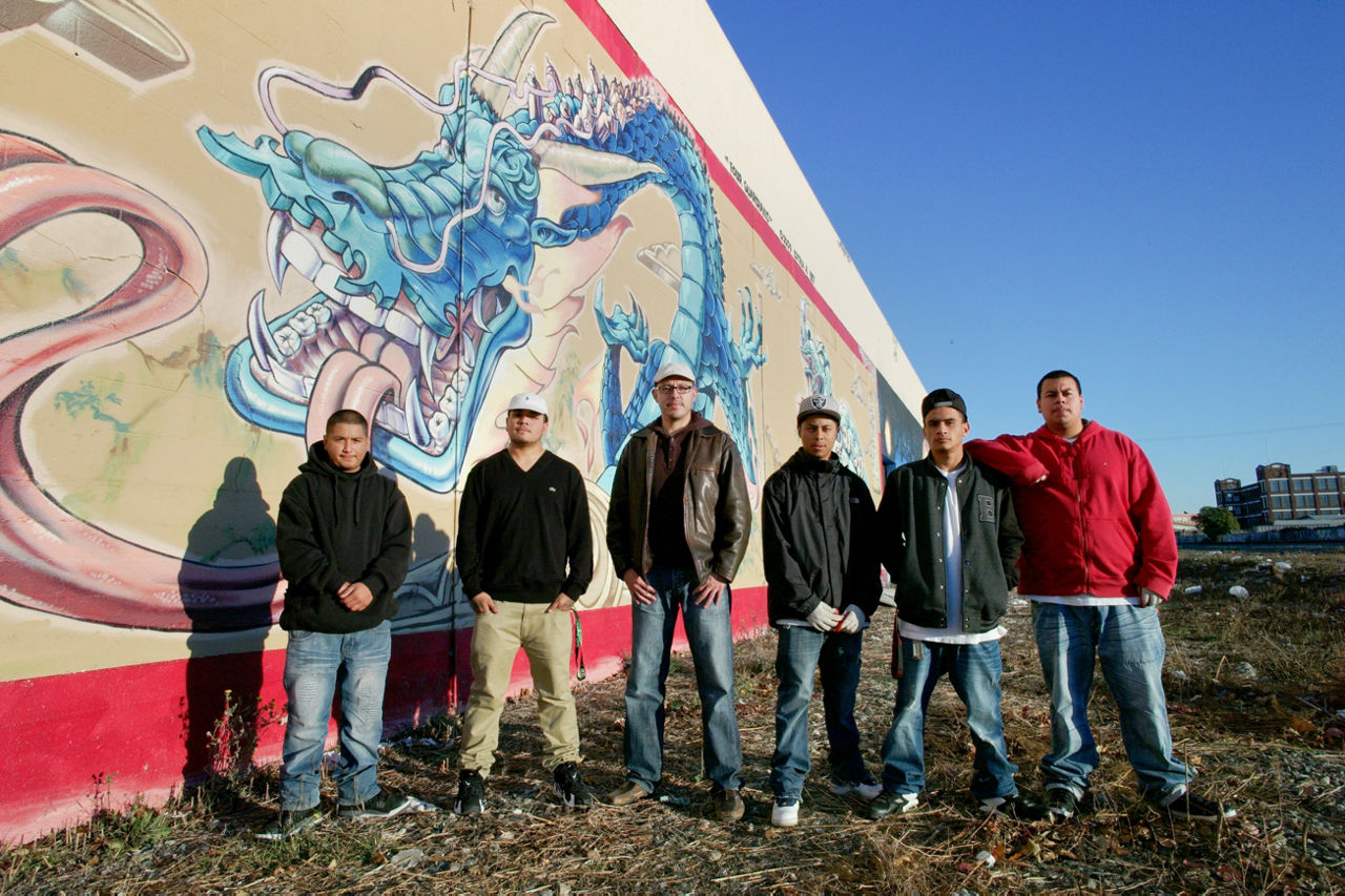 *Lead by Juan Campo, a group of guys who are a part of the EBAYC Latino Mens group clean up the trash behind the center.