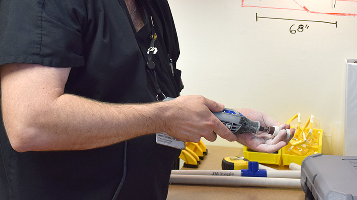 A nurse designing a gadget to improve care.
