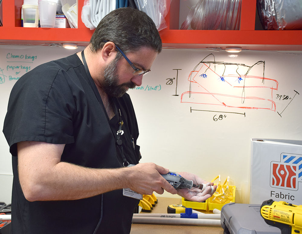 A nurse designing a gadget to improve care.