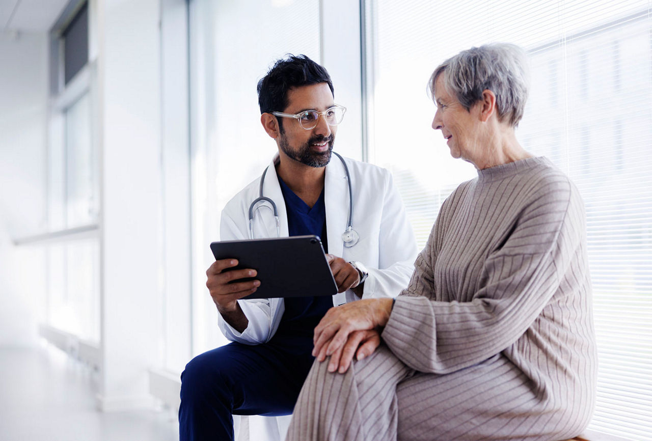 A doctor and patient talking.