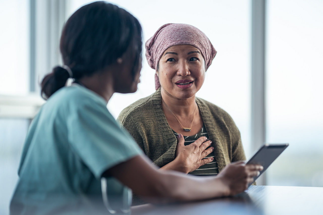 A doctor discusses a treatment plan with a patient.